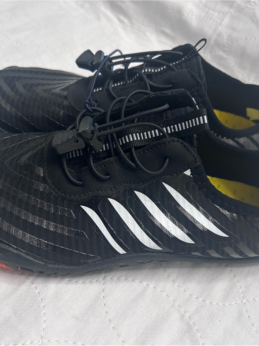Black Water Shoes with White Stripe Accents